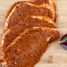 Load image into Gallery viewer, Fresh Boneless Peppered Pork Chops