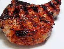 Load image into Gallery viewer, Fresh Boneless Peppered Pork Chops